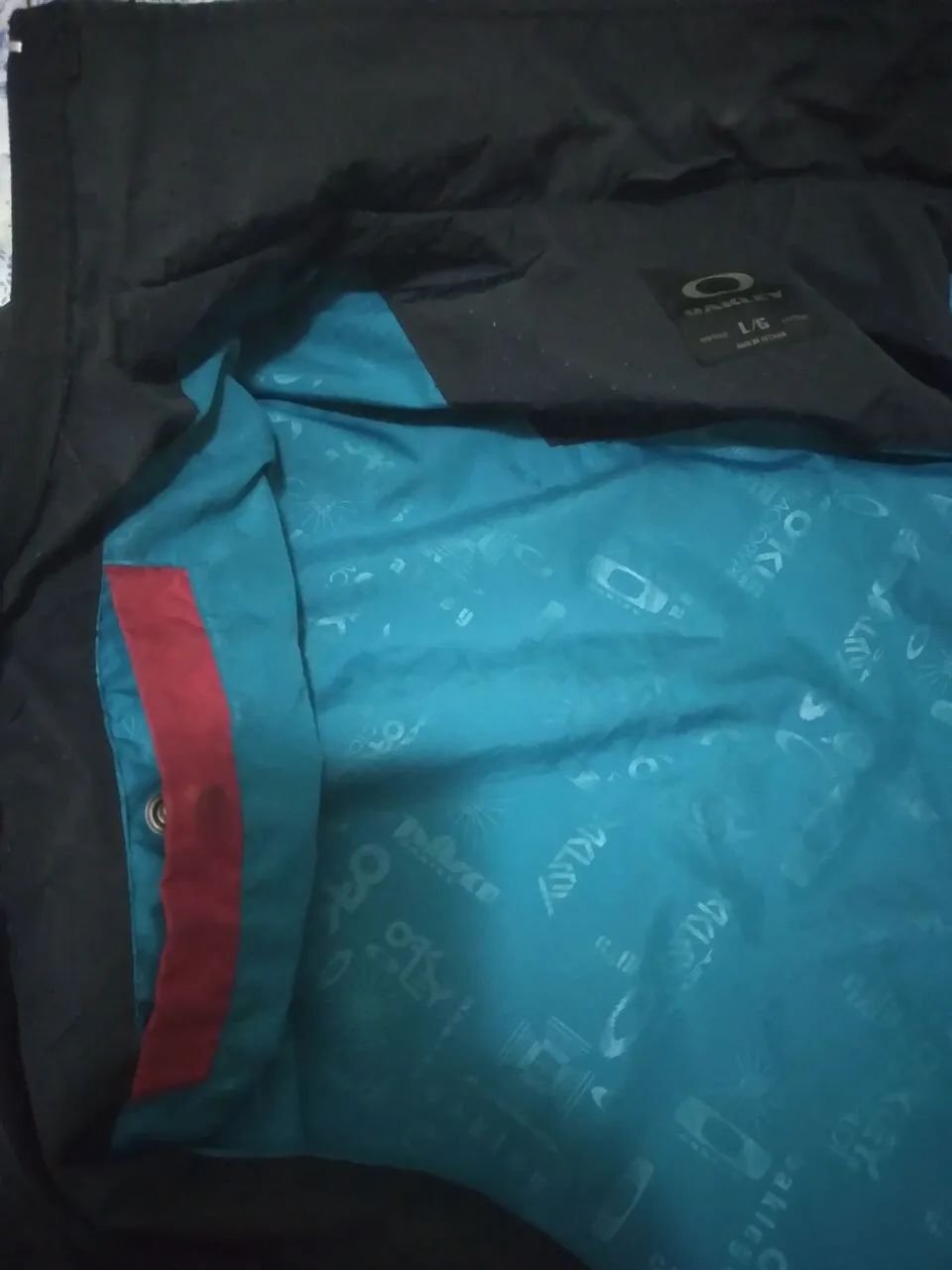 Jaqueta Oakley. Corta vento forrada azul e vermelho  - Foto 3