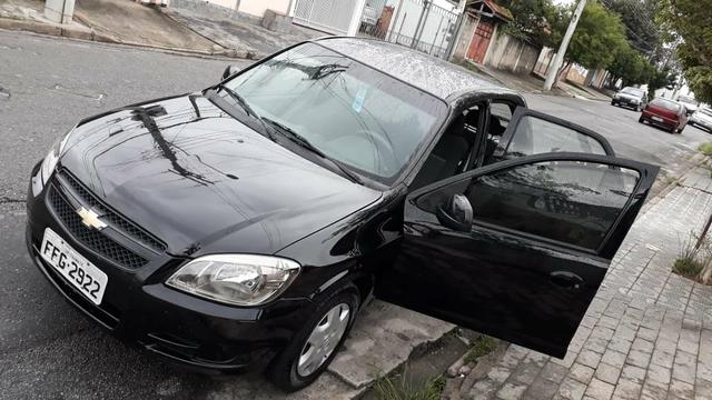 Vendo Celta Spirit/LT 1.0 - Flex 4 portas ano 2012 - Único dono - Foto 10