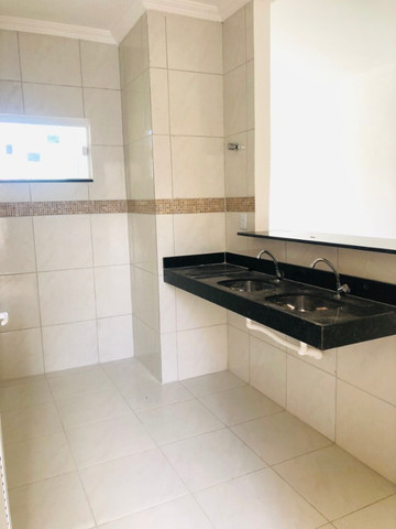 WS casa nova com 3 quartos,2 banheiros,coz.americana,quintal com otima localização - Foto 8