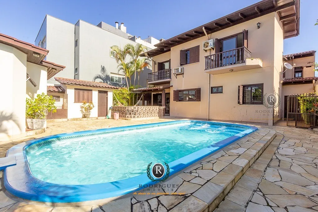 Casa venda Torres 04 dormitórios com piscina