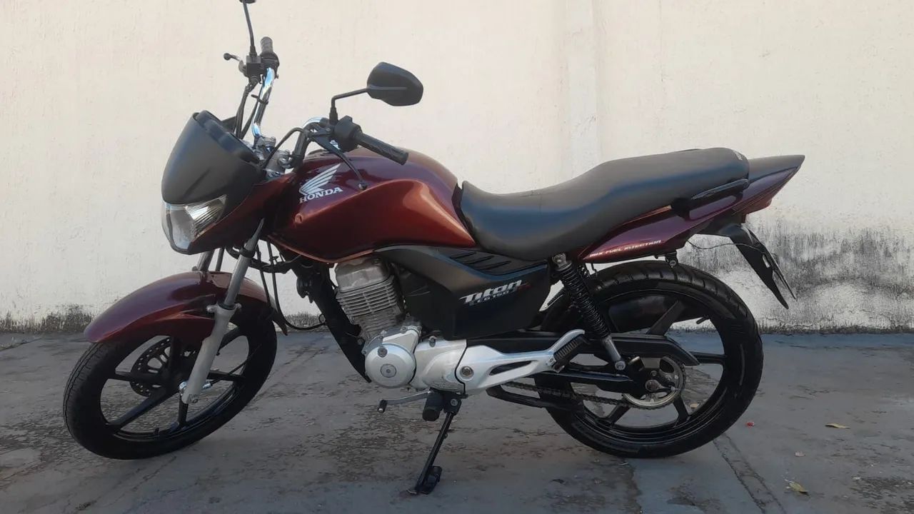 Vendo titan ex super conservado