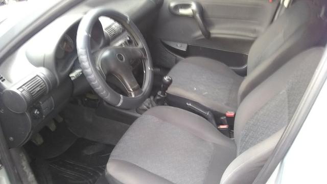 Chevrolet corsa sedã super 1.0, cor prata, completo, flex - Foto 7