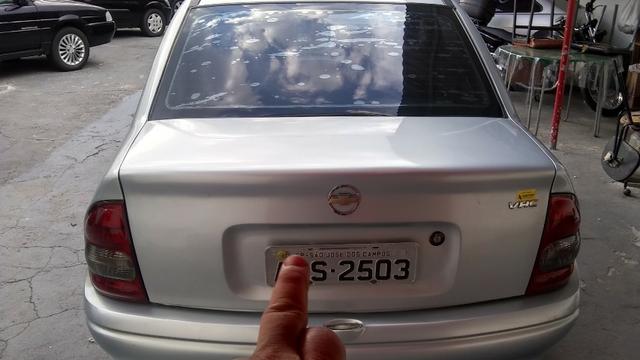 Chevrolet corsa sedã super 1.0, cor prata, completo, flex - Foto 6