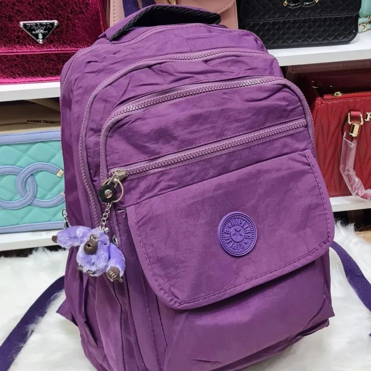 PROMOÇÃO DA SEMANA Mochila Roxo Kipling 