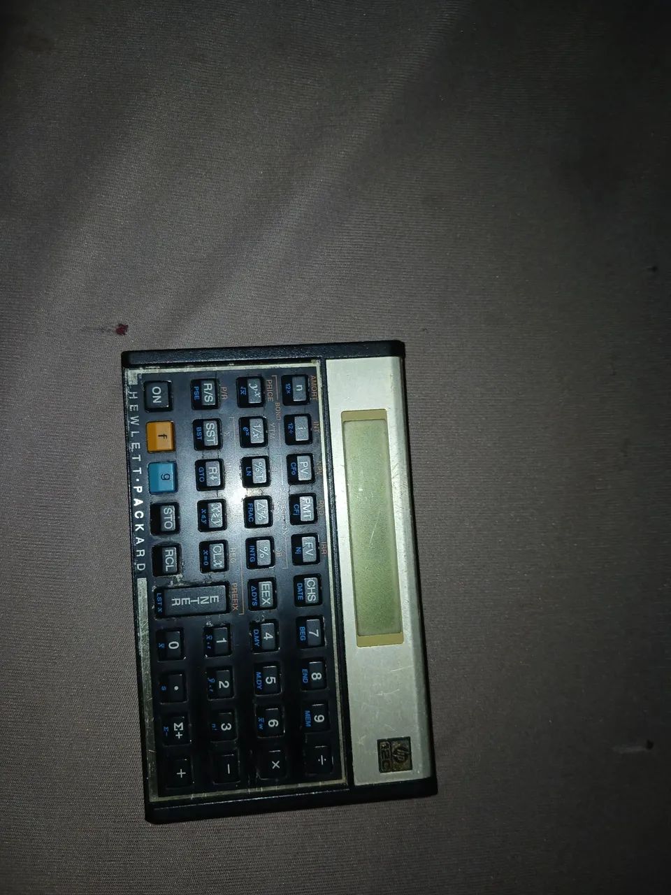 Selling old calculator (no battery included; must be purchased separately.)