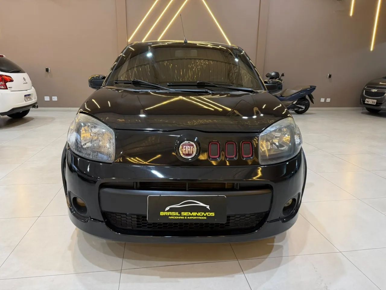 Fiat Uno Sporting 1.4 EVO Fire Flex 8V 4P 2013 - Foto 3