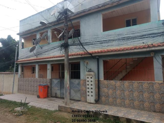 COD 168 - Prédio com 10 casas 1 e 2 qts - em frente Centro Comercial de Cabuçu - NI