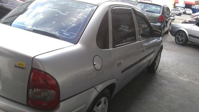 Chevrolet corsa sedã super 1.0, cor prata, completo, flex - Foto 4