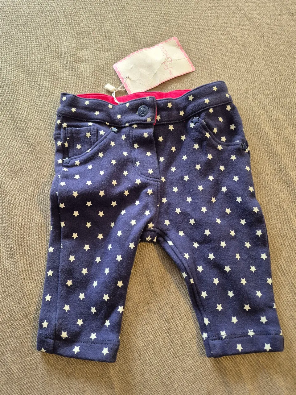 Calça de bebê Chicco com estampa de estrelas