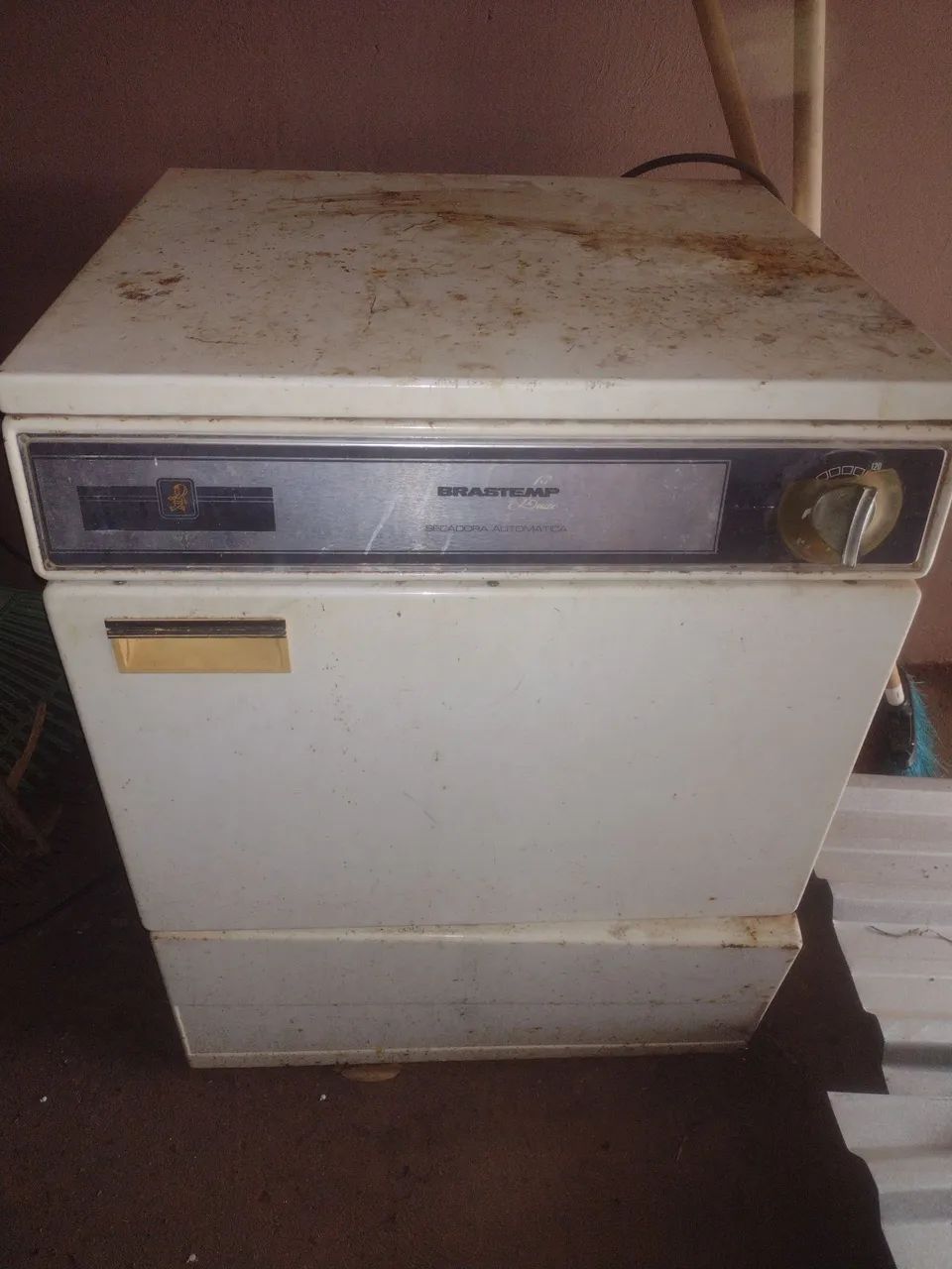 Máquina de secar roupas