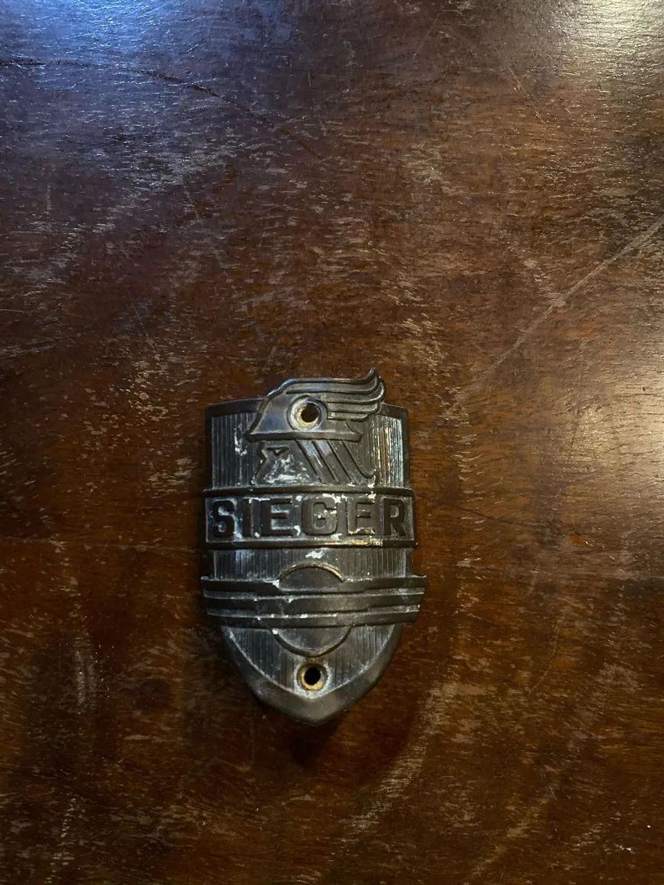 Antiga plaqueta original Sieger