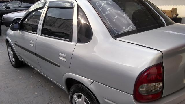 Chevrolet corsa sedã super 1.0, cor prata, completo, flex - Foto 5