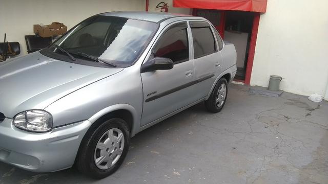 Chevrolet corsa sedã super 1.0, cor prata, completo, flex - Foto 2