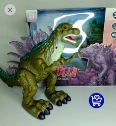 Título do anúncio: Dinossauro Godzilla com som, luz a pilha (faço entrega)