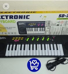 Título do anúncio: Piano/ teclado musical infantil com karaokê microfone (faço entrega)