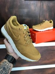 nike vibenna couro