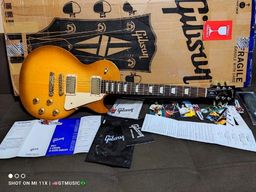 Título do anúncio: Guitarra Gibson USA Les Paul Tribute - Satin Honeyburst, certificado de autenticidade.