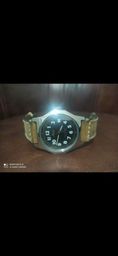 Título do anúncio: Relógio Mido suíço meca quartz 100%original funcionando precisando de revisão