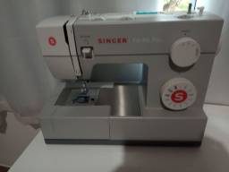 Título do anúncio: Vendo máquina de costura Singer facilita