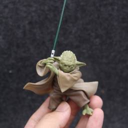 Título do anúncio: Boneco Star Wars Mestre Yoda Miniatura Action Figure Baby
