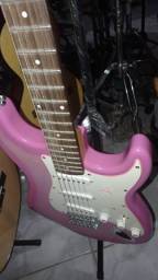 Título do anúncio: guitarra sx rosa zerada  troco ou parcelo
