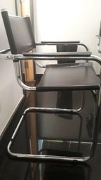 Cadeira em inox e Couro