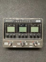 Zoom g1on na caixa manuais e cabo USB e powerbank - Instrumentos