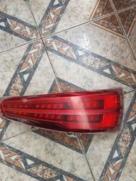 Título do anúncio: Lanterna de Audi Q 3 nova ( no plástico ) 