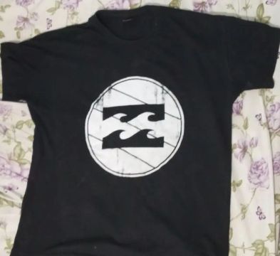 Vendo essa camiseta da Billabong tamanho G preta 100% algodão 