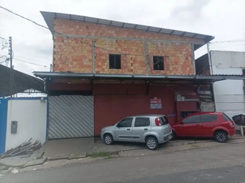 Vende-se um terreno com apartamentos