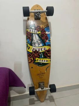 skate longboard 1886 Coca-Cola usado.