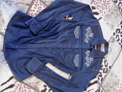 Camisa da marca Os vaqueiros 