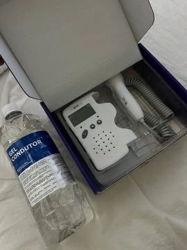 Aparelho de Ultrassom (sonar) para escutar batimentos do bebê 