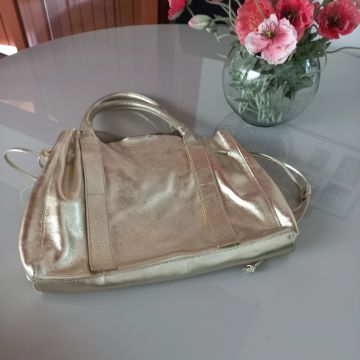 Bolsa Shoestock Dourada
