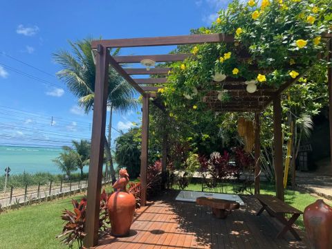 JAPARATINGA (AL) - CASA sendo 7 suítes, 10 vagas, pé na areia, frente mar