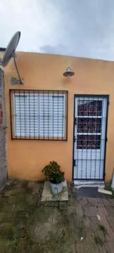 Terreno com 2 kitnets 
