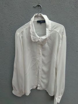 Camisa feminina manga longa.