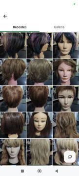 Lote de cabeças de boneca cabelo humano.
