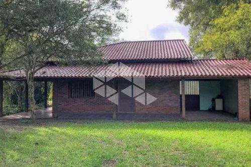 CHÁCARA COM CASA DOIS DORMITÓRIOS PERTO DA CIDADE