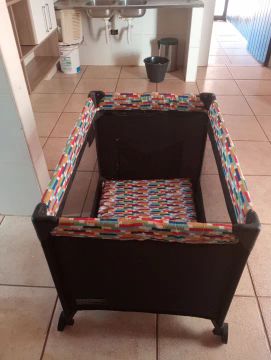 Berço portátil para bebê Voyage 