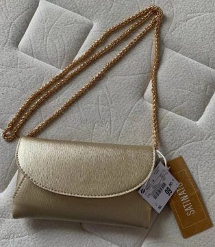 Bolsa dourada clutch renner