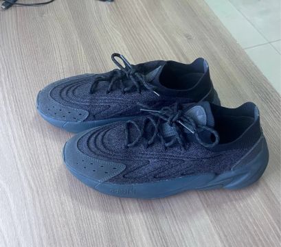 Adidas Ozelia malha (KNT)