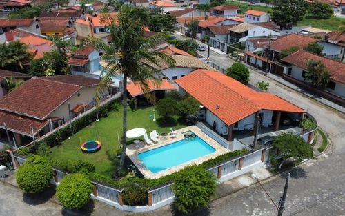 Casa praia temporada Piscina Aquecida no inverno ,salão de jogos