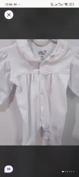 Macacão branco de bebê