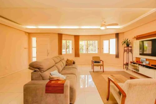 Casa com 4 dormitórios à venda no Areal, Pelotas, RS, 275 m² de área útil, 2 suítes, 5 ban
