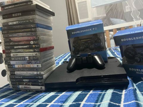 PlayStation 3 Slim Desbloqueado + 24 Jogos - R$850<br>