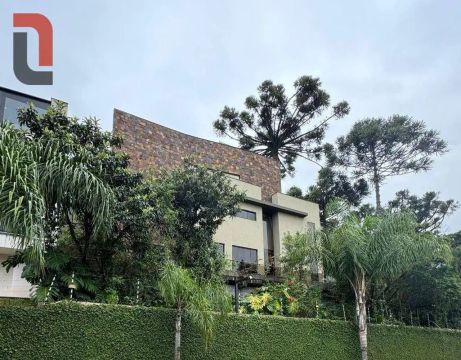 Casa com 5 suítes á venda por R$ 2.270.000 ou locação por R$ 12.000/mês - Bacacheri - Curi