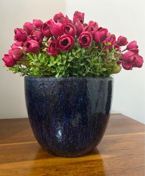 Vaso de cerâmica com arranjo