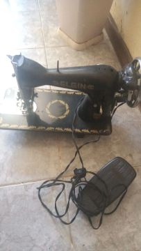Máquina de casear marca singer