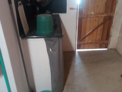Terreno com casa a venda 
